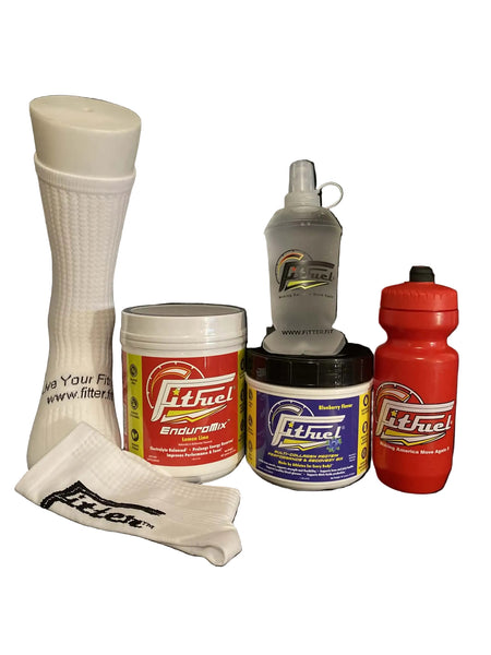 Collection of Fithuel products including a white cup, container, towel, and bottles on a black background