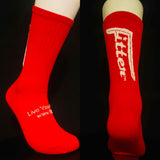Red socks with text on a black background