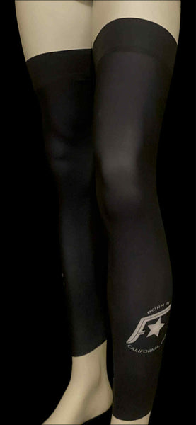 Black knee-high socks with a logo on a black background