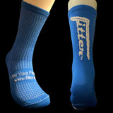 Blue socks with white text on a dark background